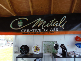 Mitali Creative Glass logo with glass pieces below